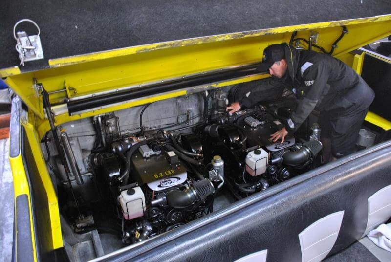 Jet boat driver checking Jet boat engine