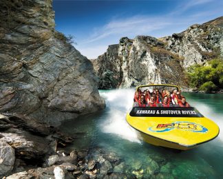 Jet boating Kawarau Jet KJet with rocks on the Shotover River