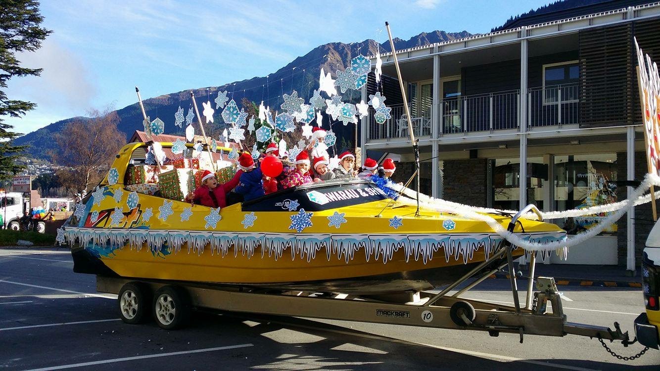 KJet Winter festival with kids on jet boat in Queenstown CBD